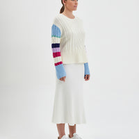 Vibrant multi-color Burra crochet sweater in cozy Merino wool