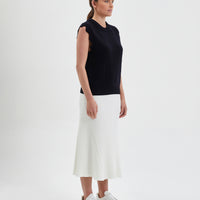 Flattering black ladies knit vest with a timeless design, crafted from merino wool.