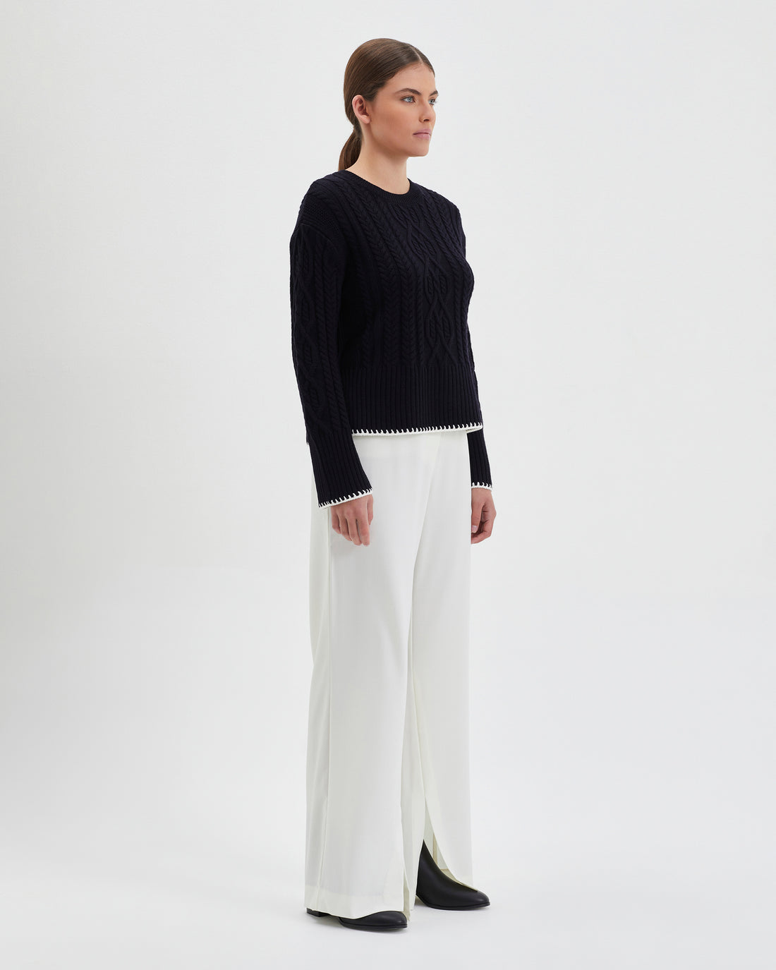Sophisticated black Burra crochet sweater in cozy Merino wool