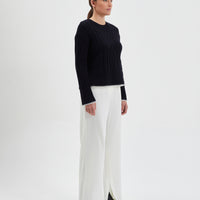 Sophisticated black Burra crochet sweater in cozy Merino wool