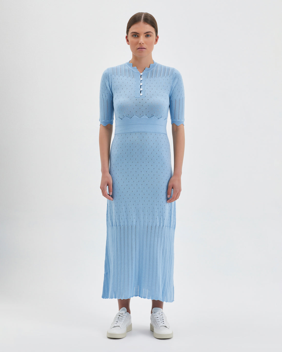 Seafoam Pointelle Knit Dress with fitted corset-style bodice and pleated skirt.