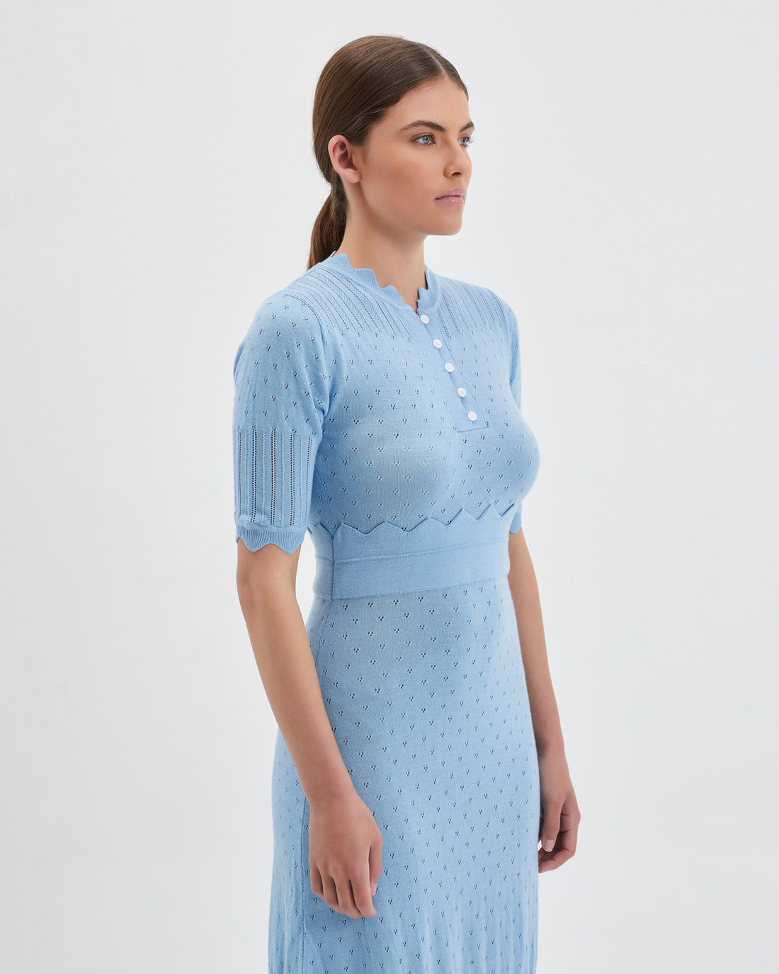 Elegant scalloped sleeves on seafoam-colored Pointelle Knit Dress.