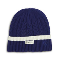 Close-up of Navy wool beanie, made from high-quality merino wool.