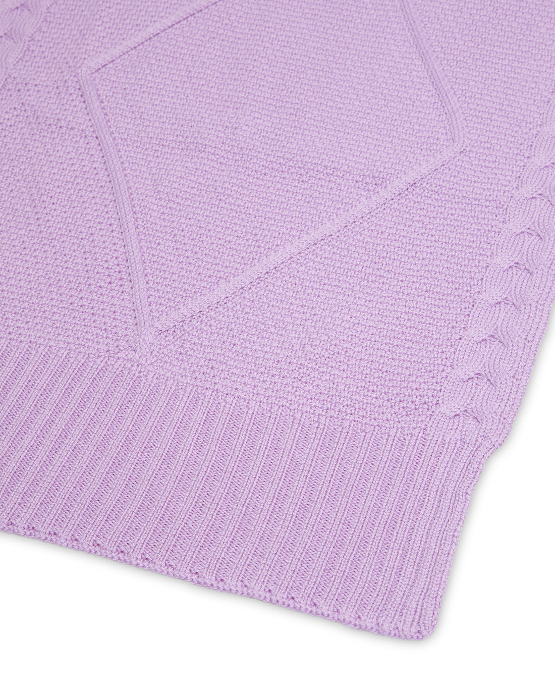 Close-up of Iris merino wool scarf with intricate cable pattern.
