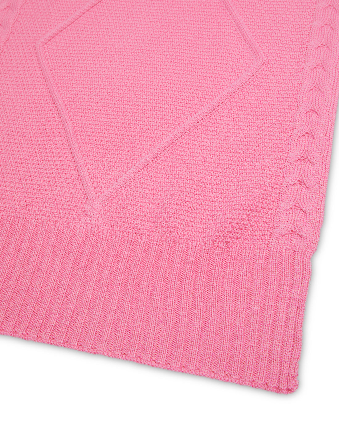 Close-up of Candy merino wool scarf showcasing cable details.