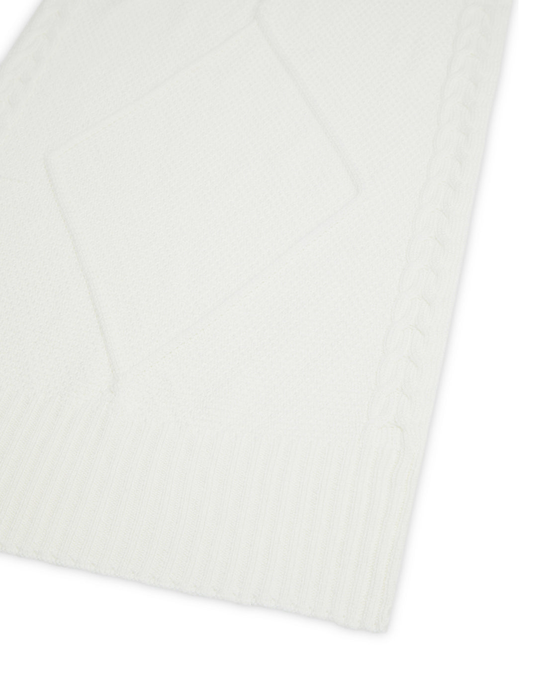 Close-up of Ivory merino wool scarf showcasing intricate cable knit.
