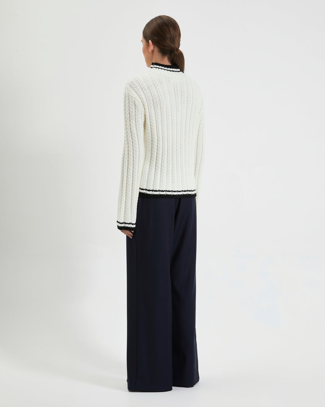 Elegant crew-neck wool jumper crafted from Australian Merino wool, ideal for layering.