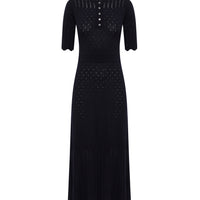 Close up of front view of pointelle wool dress with pointelle and scallop fine details