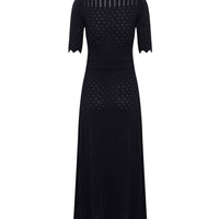 Close up of back view of pointelle wool dress with pointelle and scallop fine details