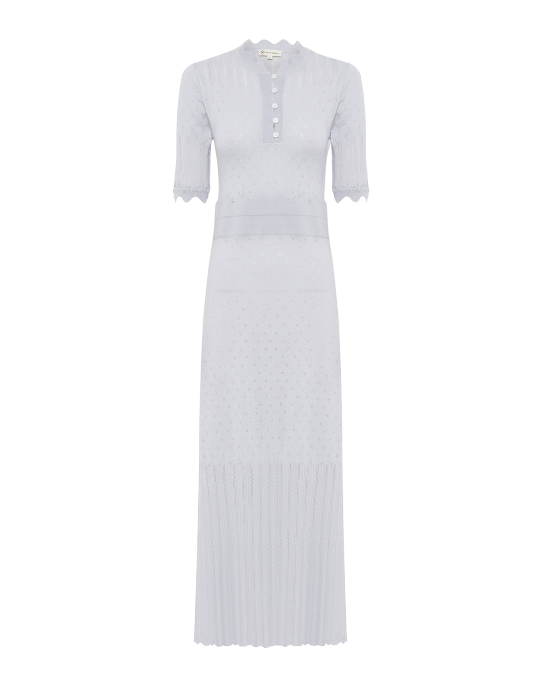 Close up of front view of pointelle wool dress with pointelle and scallop fine details