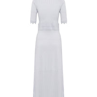 Close up of back view of pointelle wool dress with pointelle and scallop fine details