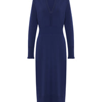 a classic fitted, long-sleeve navy dress with intricate ruffle details.
