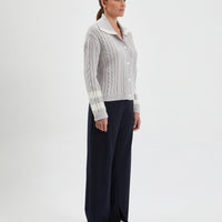 Model wears the Petrisse wool cardigan