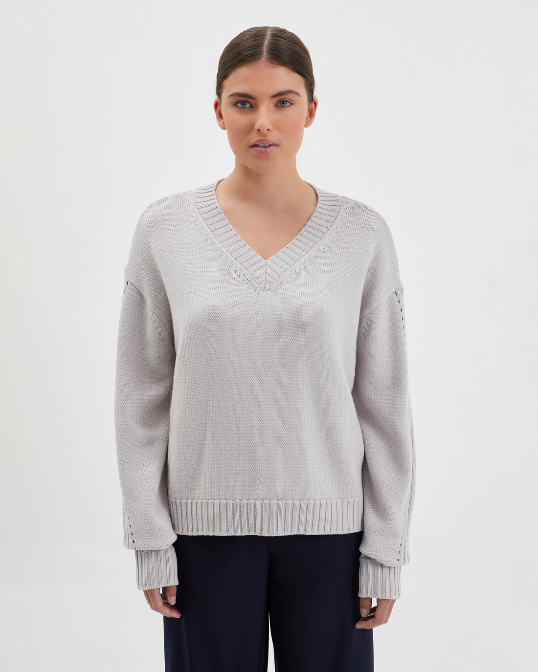 Paris Pointelle Merino wool knit sweater with elegant pointelle design.
