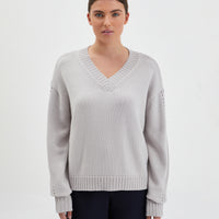 Paris Pointelle Merino wool knit sweater with elegant pointelle design.