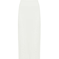 Close up of ivory merino wool midi skirt with plait like cable details.