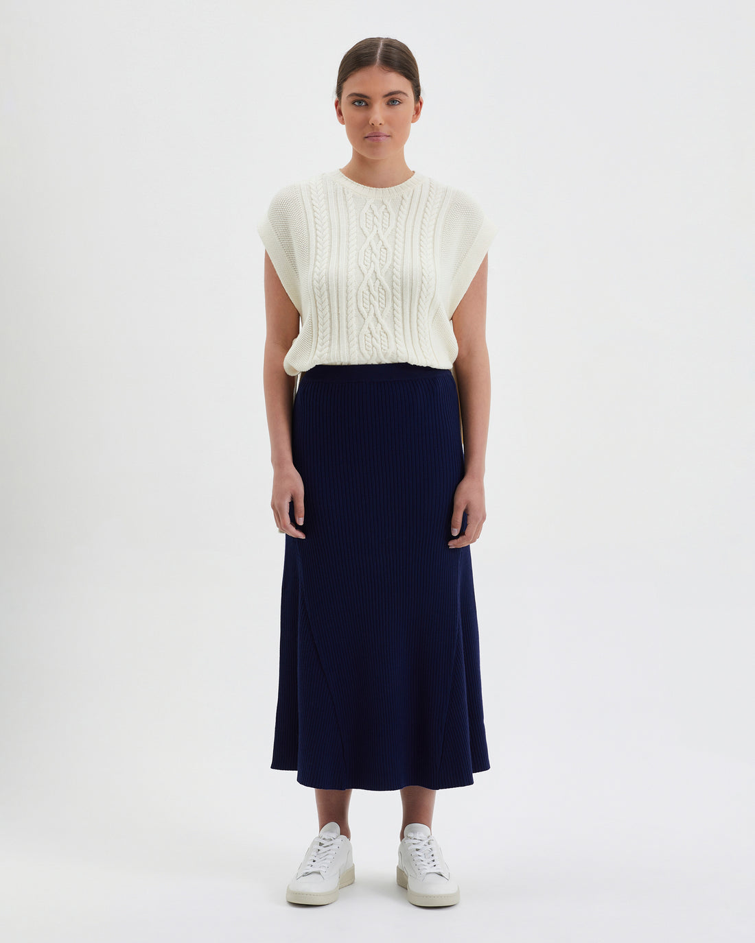 Navy Rachel Midi Skirt in merino wool with A-line and flared hem.