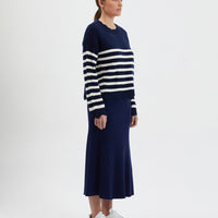 Navy striped womens knit sweater in wool, featuring scalloped details.
