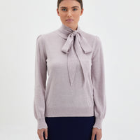 Close-up of rose melange Jacqueline Bow Sweater in 100% Merino wool.