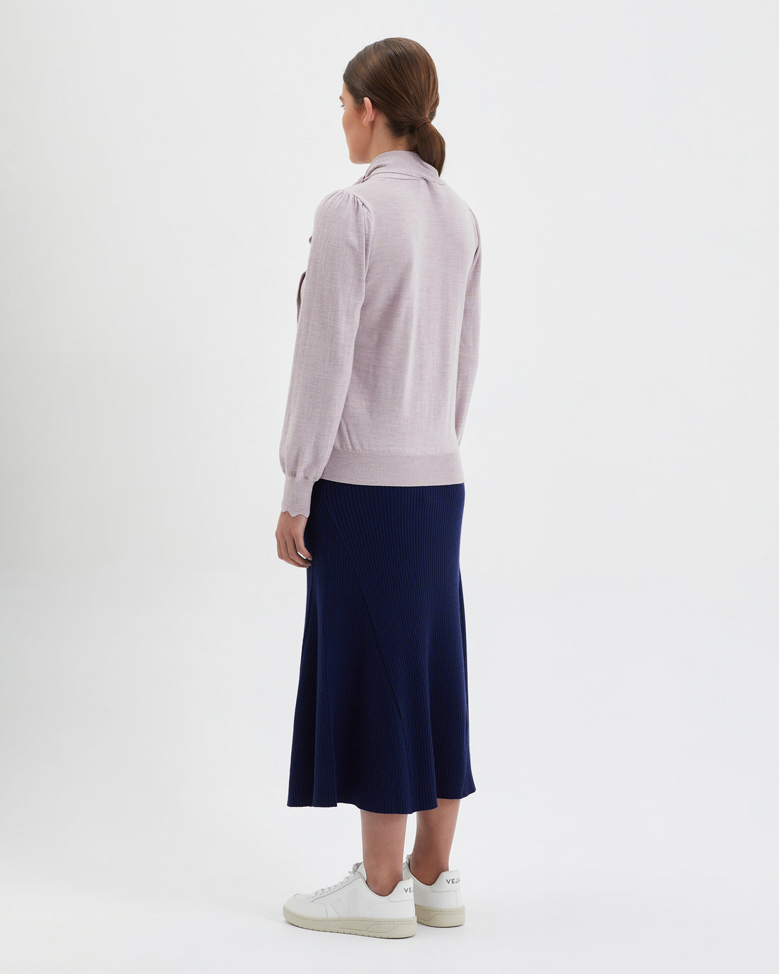 Jacqueline Bow Sweater in rose melange, crafted from soft Merino wool for versatile wear.
