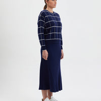 Bold navy wool jumper in gingham pattern