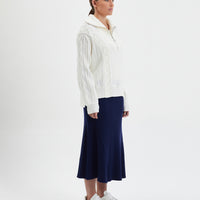 Ivory wool jumper with half-zip, crafted from premium Australian Merino wool.