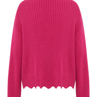 Close up of back view of the peony scallop sweater pointelle and scallop details.