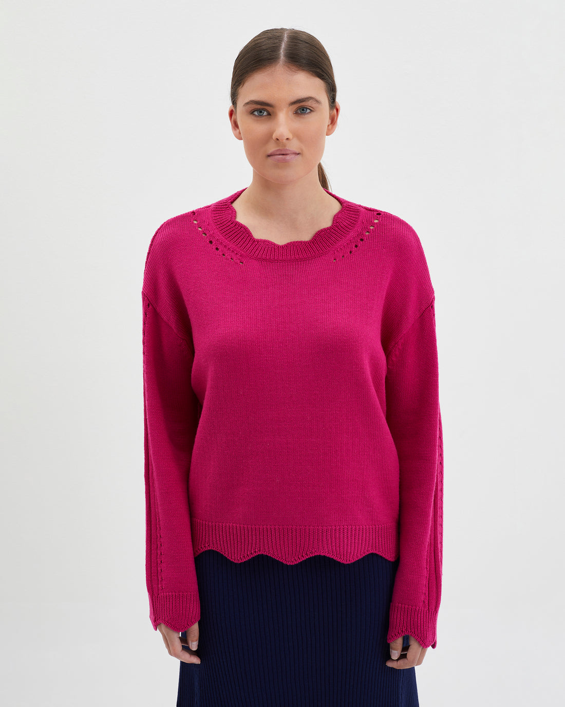Scallop wool sweater in cream with romantic scalloped edging.