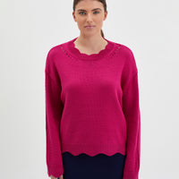 Scallop wool sweater in cream with romantic scalloped edging.