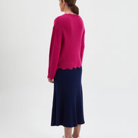 Cozy womens knit sweater in sage wool with stylish scalloped edges.