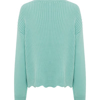 The sweater has a relaxed fit, offering comfort and effortless style for cool weather days