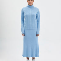 Merino wool cable knit jumper with roll neck in a seafoam colour