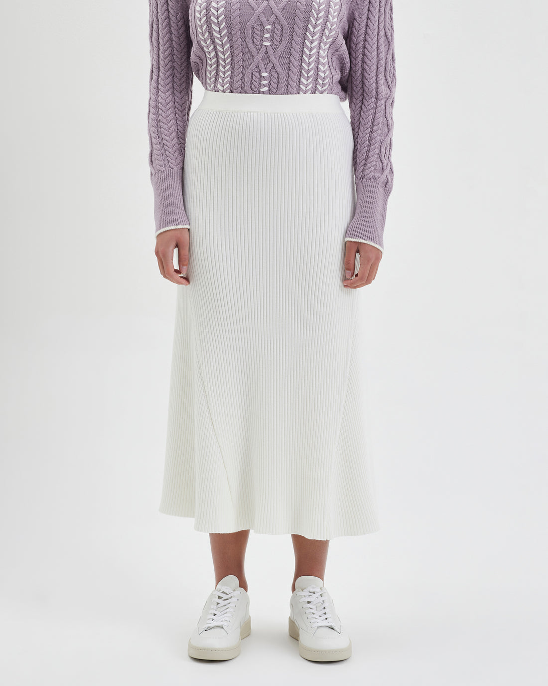 Flared wool skirt in ivory, designed with a flattering bias cut.