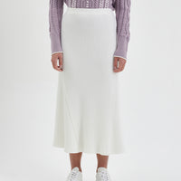 Flared wool skirt in ivory, designed with a flattering bias cut.