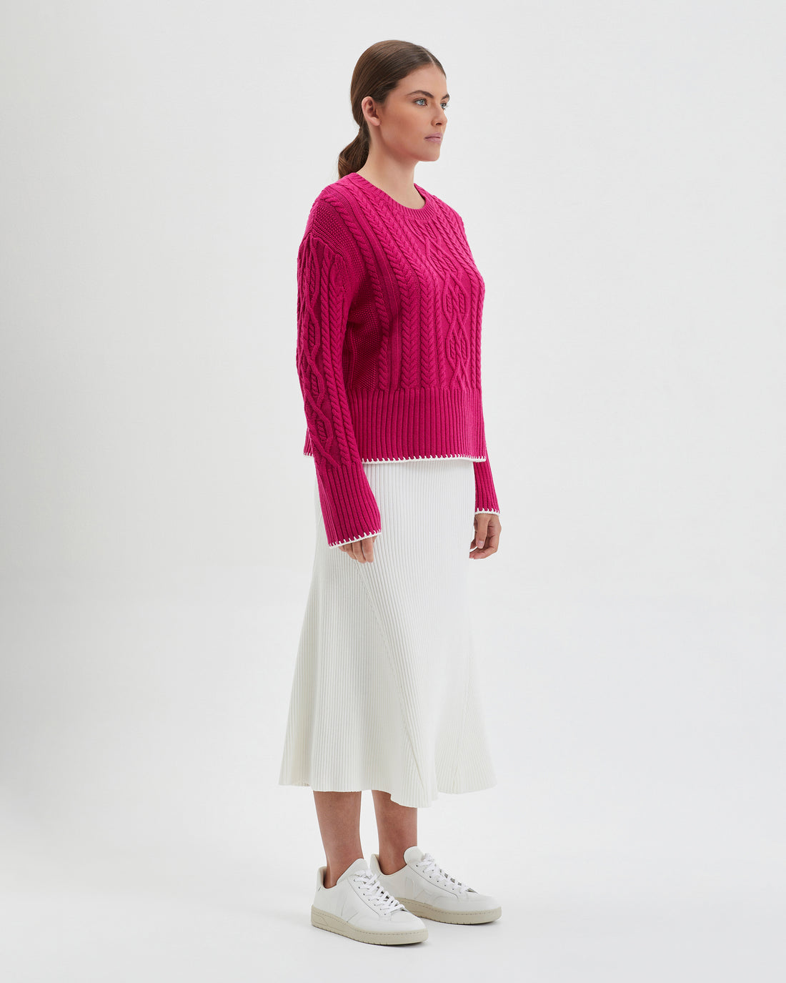 Elegant pink Burra crochet sweater in cozy Merino wool