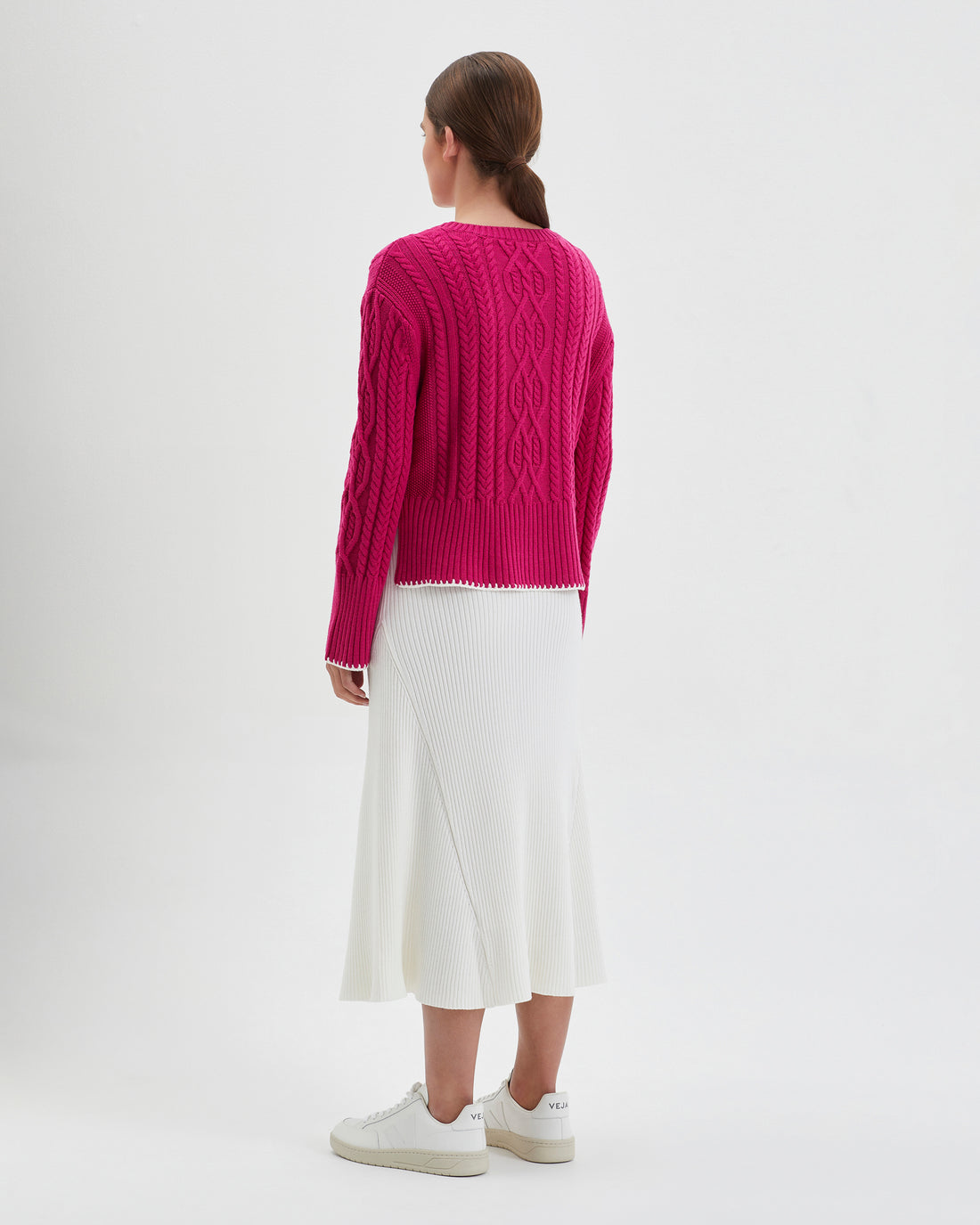 Statement pink Merino wool sweater with crochet details