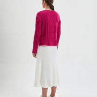 Statement pink Merino wool sweater with crochet details
