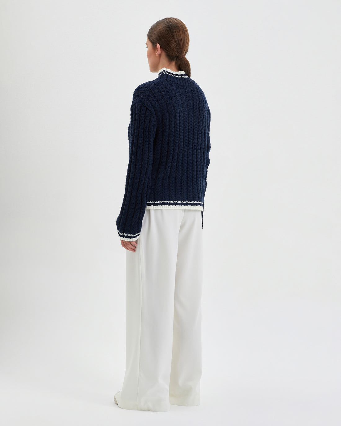 Elegant crew-neck wool jumper crafted from Australian Merino wool, ideal for layering.