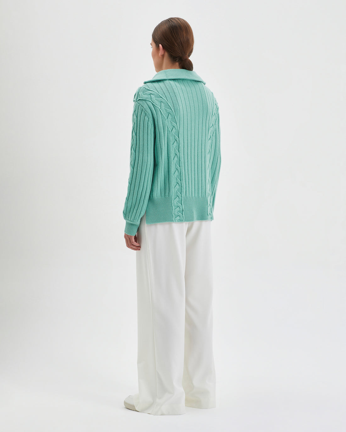 Relaxed-fit Nerida Sweater in sage, crafted from cozy Australian Merino wool.