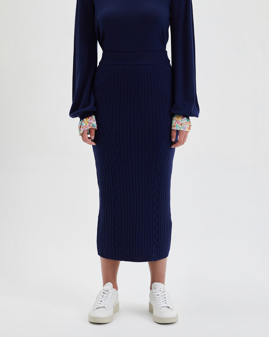 Luxurious wool skirt in navy with soft, flattering fit for winter.