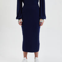 Luxurious wool skirt in navy with soft, flattering fit for winter.