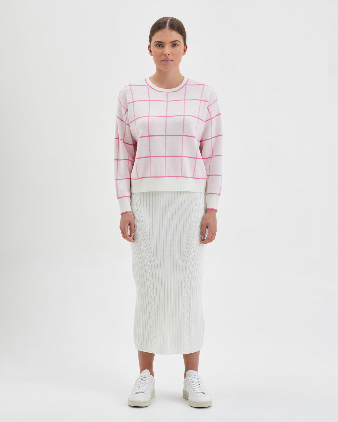 Bold pink wool jumper in gingham pattern