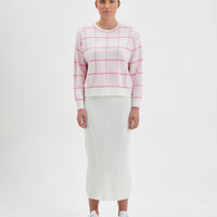 Bold pink wool jumper in gingham pattern