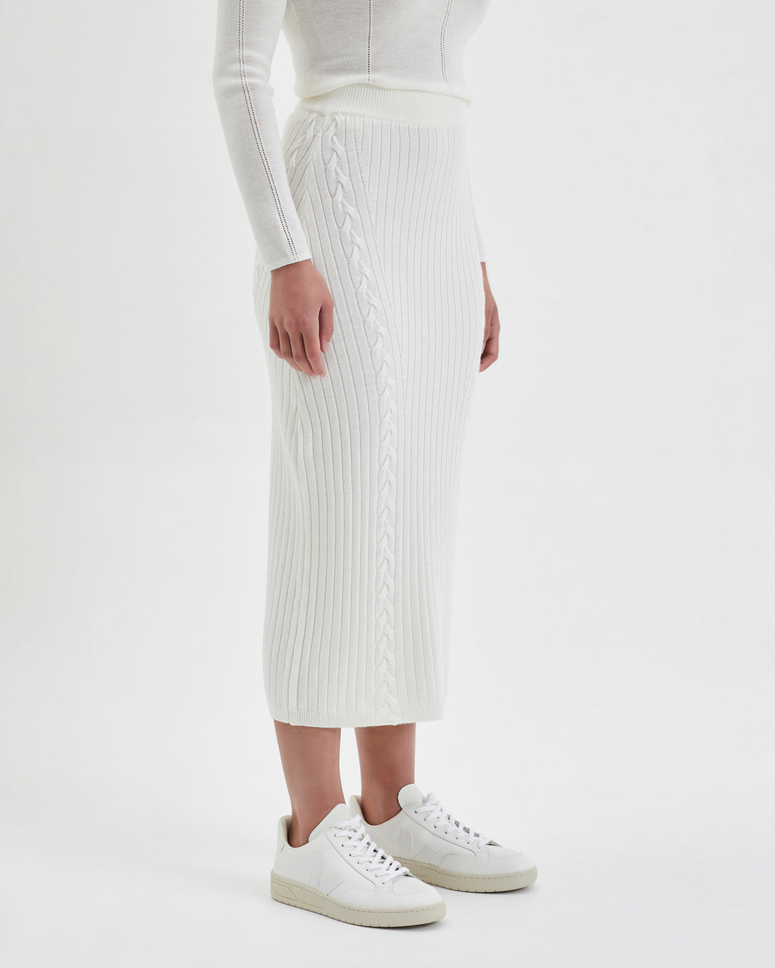 Wool skirt in ivory, designed for warm and versatile winter style.