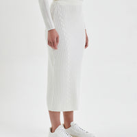 Wool skirt in ivory, designed for warm and versatile winter style.