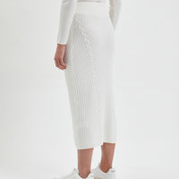 Elegant ivory merino wool midi skirt with blanket-like comfort.