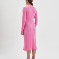 Pink merino wool dress with elegant lapel-style collar and cables.