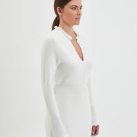 Romantic ivory wool dress crafted for timeless style.