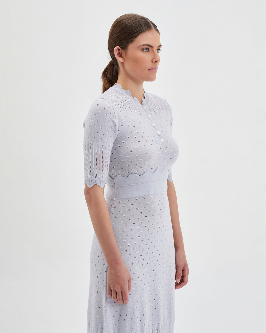 Elegant scalloped sleeve details on pearl-colored Pointelle Knit Dress.