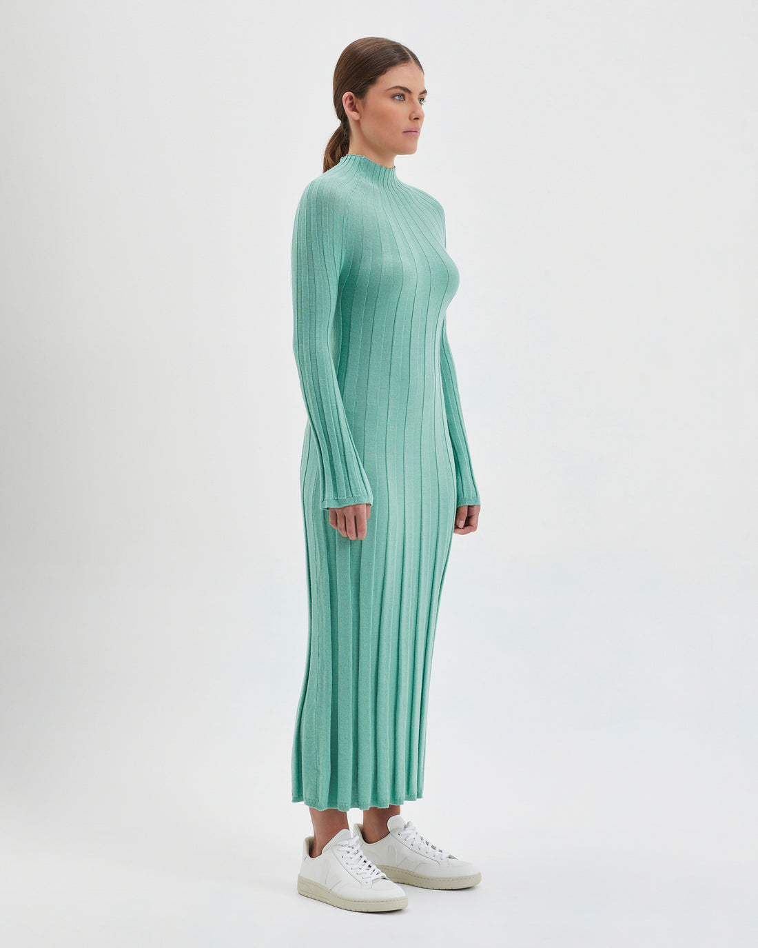 Cozy wool dress in sage, crafted for comfort and elegance.
